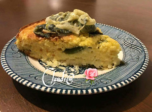 Una foto de Pastel de elote con rajas poblanas🌹