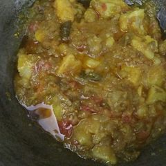 A picture of Eggplant and potato curry.