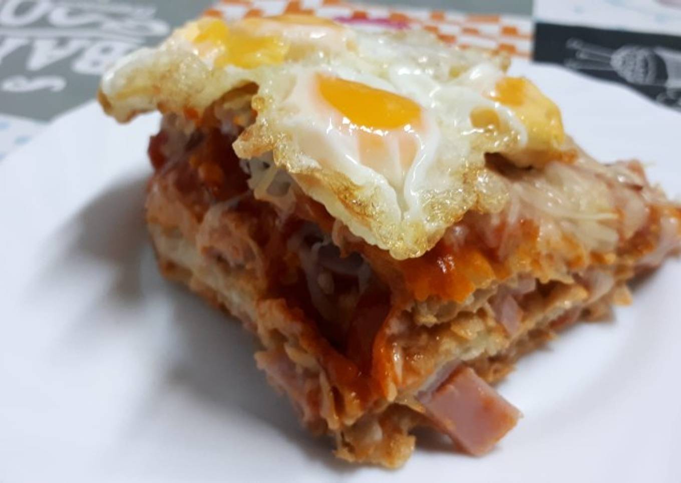 Lasaña de berenjena con sombrero de huevos de codorniz