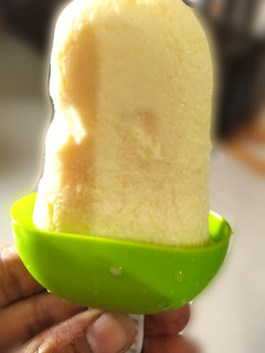A picture of Kesar badam popsicles.