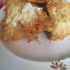 A picture of Fried Awara (tofu) in Egg.
