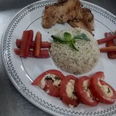 Roasted lemon chicken with rice A picture of Roasted lemon chicken with rice.