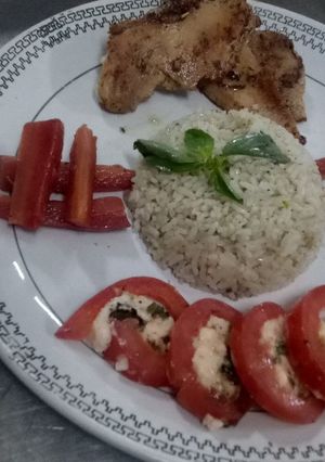 A picture of Roasted lemon chicken with rice.