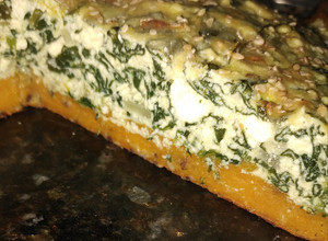 Una foto de Tarta de ricota y espinaca con base de zapallo kabutia 💚