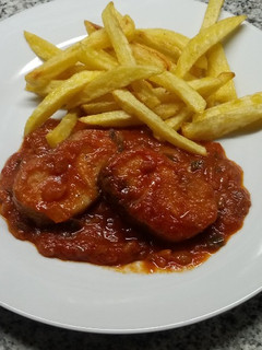 Una foto de Bonito con tomate