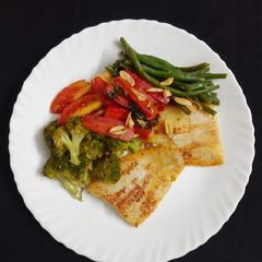 Orange Fish with veggies (Healthy Meal option) A picture of Orange Fish with veggies (Healthy Meal option).
