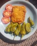 🐷 Lomo empanado 🥖 con queso 🧀 y pimientos 🫑 del Padrón