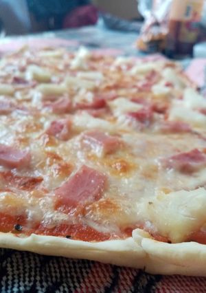 Una foto de Pizza hawaiana