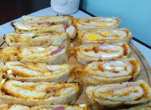 Una foto de Pizza arrollada