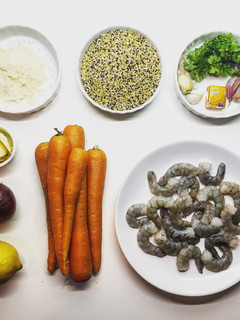 A picture of Garlic Shrimps with Quinoa and Roasted Carrots.