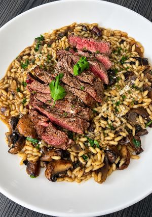 A picture of Fillet Steak with White Truffle Mushroom Risotto.