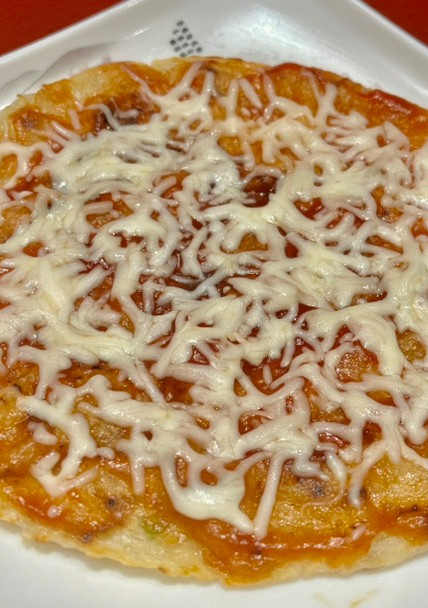 Una foto de Pizza 🍕 Falsa