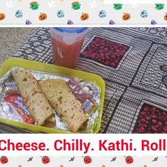 Cheese Chilli Kathi Roll with carrot juice A picture of Cheese Chilli Kathi Roll with carrot juice.
