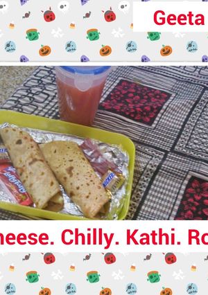 A picture of Cheese Chilli Kathi Roll with carrot juice.