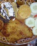 Milanesa de pollo con guarnición a la Mario, s