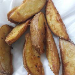 A picture of Potatoes Wedges.