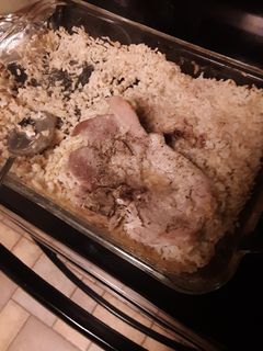 A picture of Baked Pork Chops and Brown Rice GF.