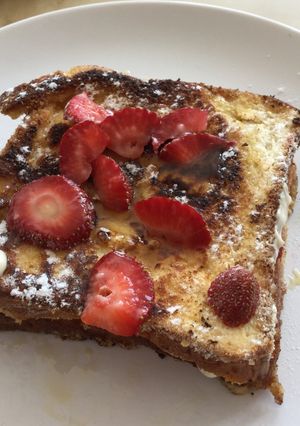 A picture of Breakfast french toast with strawberries.
