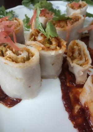 A picture of Rice Roulade with mixed vegetables.