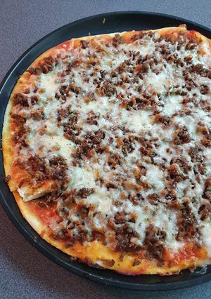 Une photo de Pizza viande hachée mozzarella