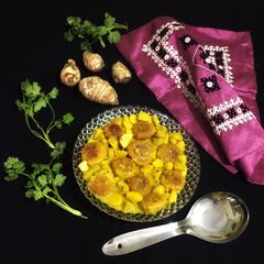 A picture of Paneer Kofta in Taro Root Bulbs.