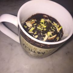 A picture of 1Min Choco Mug Brownie in microwave (eggless).