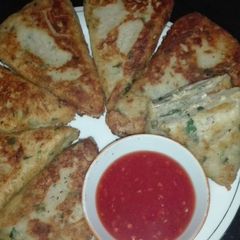 A picture of Potato Pie Filled with Grilled Chicken Tikka and cheese.