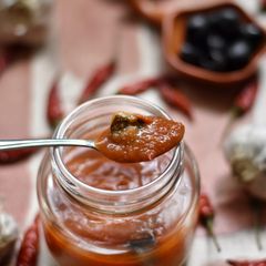 A picture of Marinara Sauce with Olives & Jalapeno.