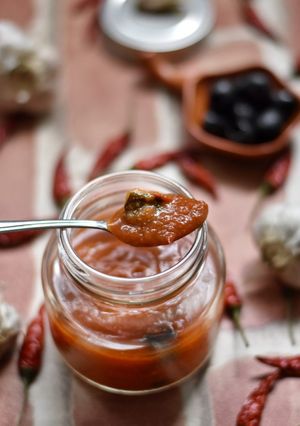 A picture of Marinara Sauce with Olives & Jalapeno.