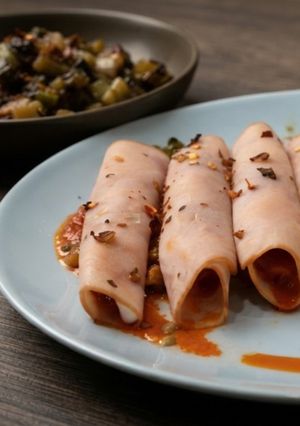 Foto principal de Ballotinas Estofados de Pavo con Corazón Fundido de Sobrasada y Miel al Vapor