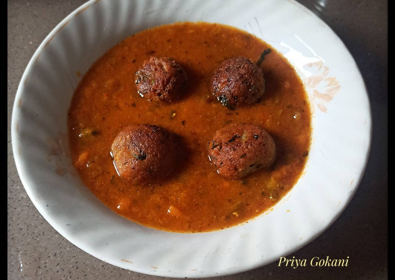 Paneer Kofta dipped in Red Gravy