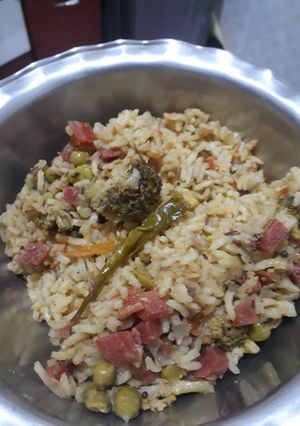 A picture of Dal khichdi with vegetables.