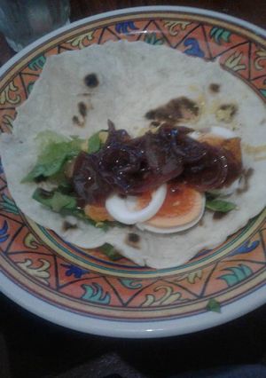 Una foto de Tacos de pollo al curry simples