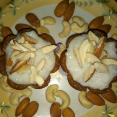 A picture of Rice kheer in biscuit bowl.