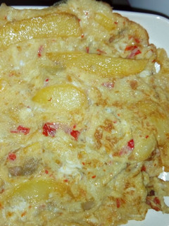 A picture of Chips in fried egg.