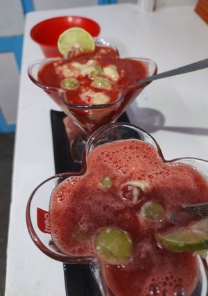 A picture of Watermelon mocktail with kulfi ice cream.