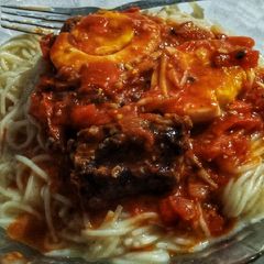A picture of Spaghetti Egg Curry.