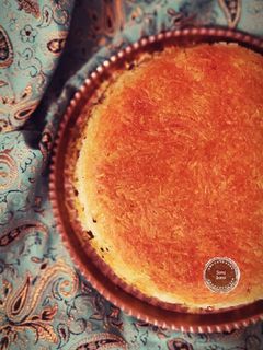 عکسی از دستور ته دیگ سیب زمینی رنده شده