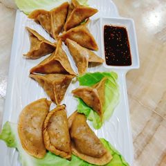 A picture of Momos/ Gyoza /Dumplings.