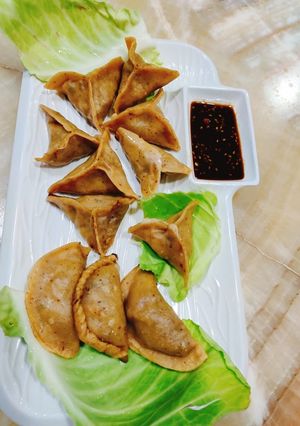 A picture of Momos/ Gyoza /Dumplings.