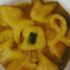 A picture of Dal pithi.