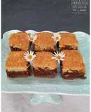 Cuadraditos de coco, dulce de leche y chocolate