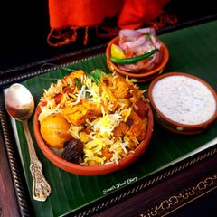 A picture of Veg dum Biryani in Pressure Cooker.