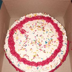 A picture of Red velvet cake with icing.