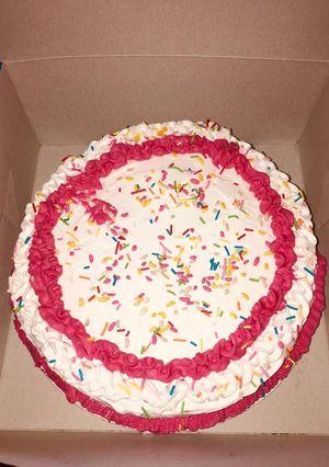 A picture of Red velvet cake with icing.