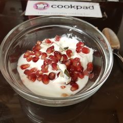 A picture of My Pommegranite & Greek Yogurt Breakfast will some Seeds.