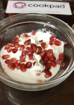 A picture of My Pommegranite & Greek Yogurt Breakfast will some Seeds.