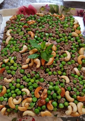 صورة لوصفة رز مع بازيلاء باللحمة المفرومة
