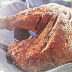 A picture of Tandoori chicken in micro wave.