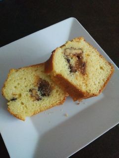 Una foto de Torta con corazón de nueces, dulce de leche y chocolate
